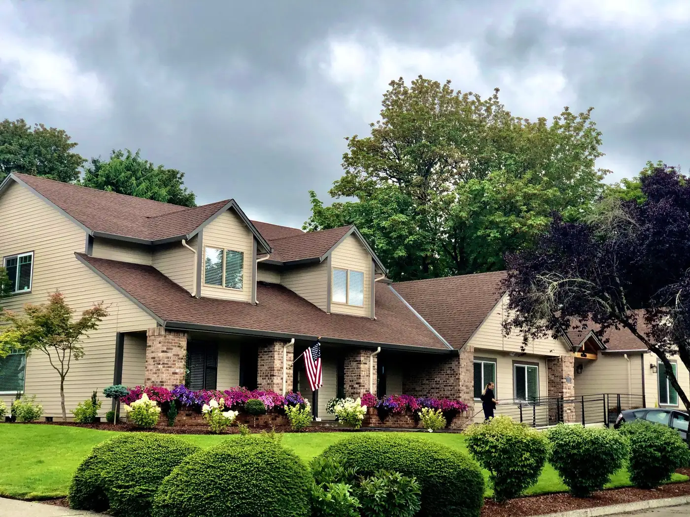 Fairway Home Care, a two-story house with flower beds and a manicured lawn in Vancouver, Washington